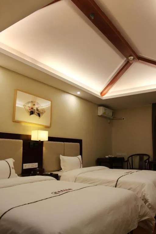 Bed in BOOK PAVILION HOTEL