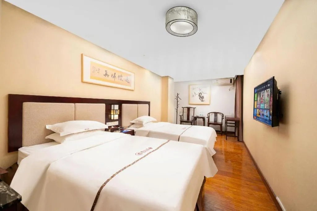 Bed in BOOK PAVILION HOTEL