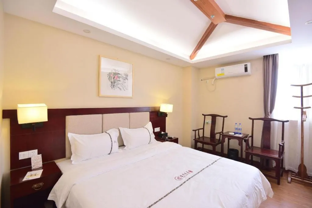 Bed in BOOK PAVILION HOTEL