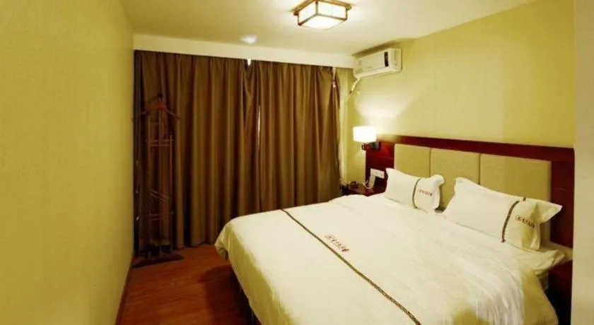 Bed in BOOK PAVILION HOTEL