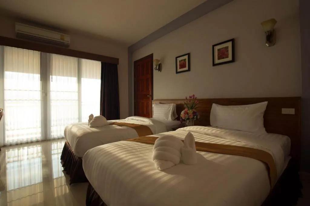 Bed in Royal Hill Satun Hotel