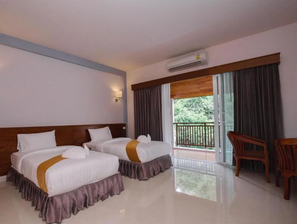 Bed in Royal Hill Satun Hotel