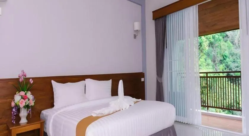 Bed in Royal Hill Satun Hotel