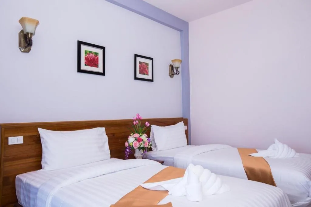 Bed in Royal Hill Satun Hotel