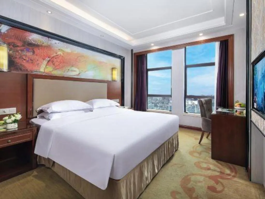 Bed in Vienna International Hotel Nanning Railway Station Mingxiu Road Metro Station