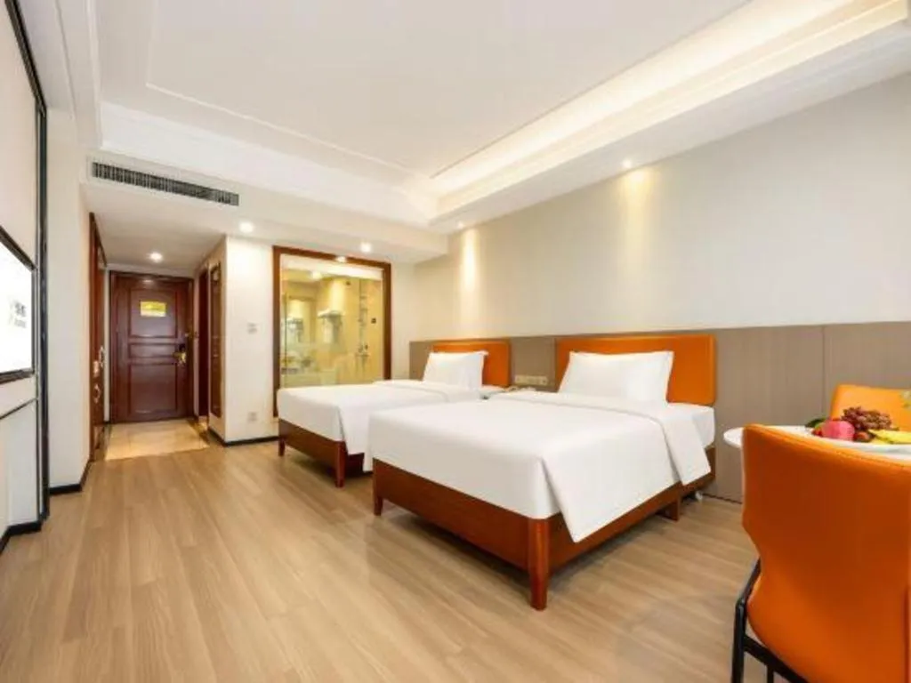 Bed in Vienna International Hotel Nanning Railway Station Mingxiu Road Metro Station