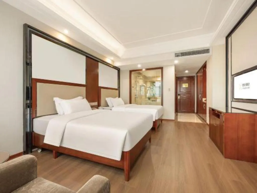 Bed in Vienna International Hotel Nanning Railway Station Mingxiu Road Metro Station