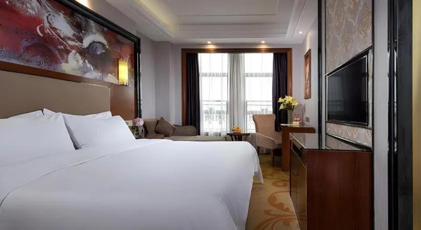 Bed in Vienna International Hotel Nanning Railway Station Mingxiu Road Metro Station