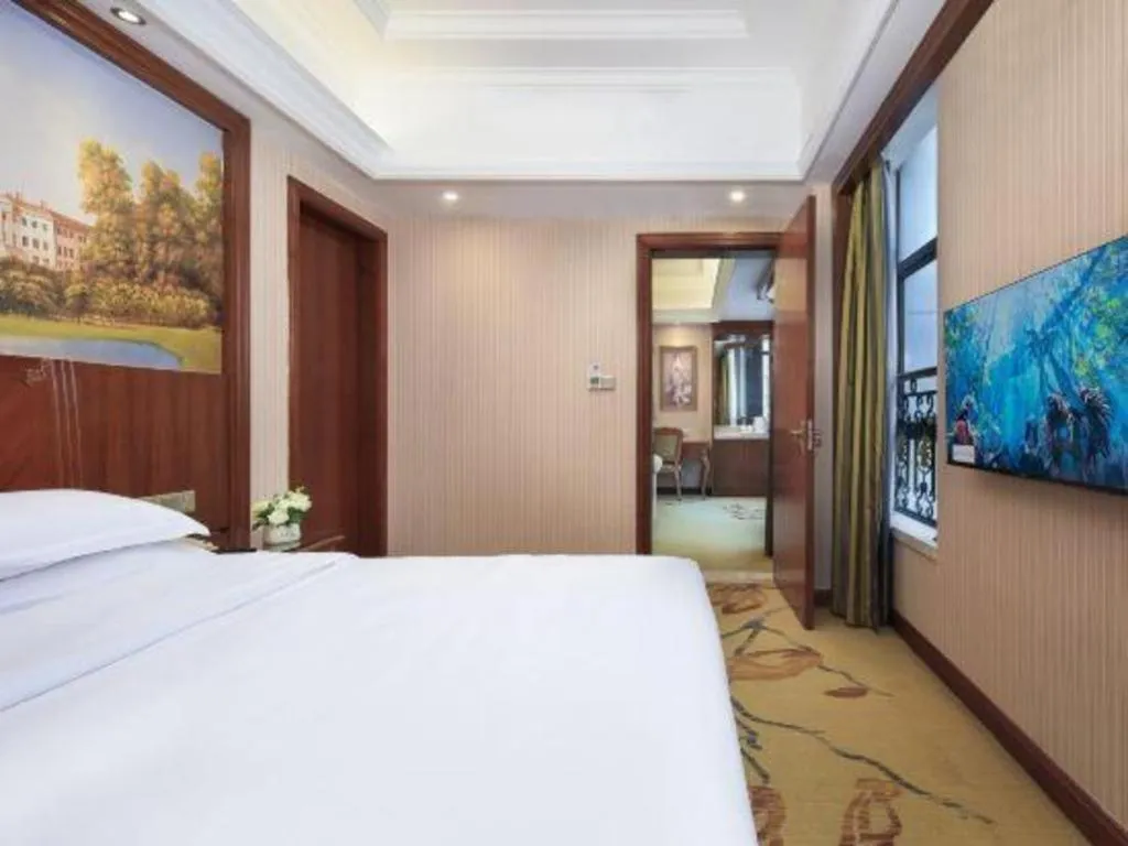 Bed in Vienna International Hotel Nanning Railway Station Mingxiu Road Metro Station