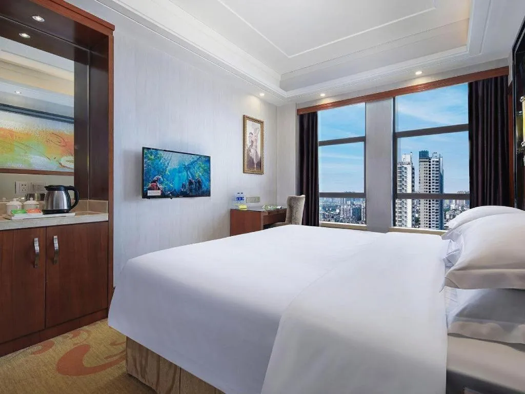 Bed in Vienna International Hotel Nanning Railway Station Mingxiu Road Metro Station