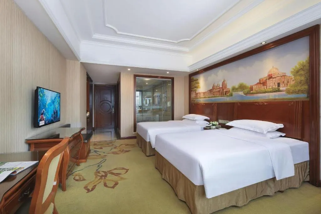 Bed in Vienna International Hotel Nanning Railway Station Mingxiu Road Metro Station