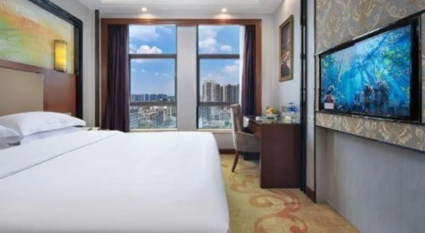 Bed in Vienna International Hotel Nanning Railway Station Mingxiu Road Metro Station