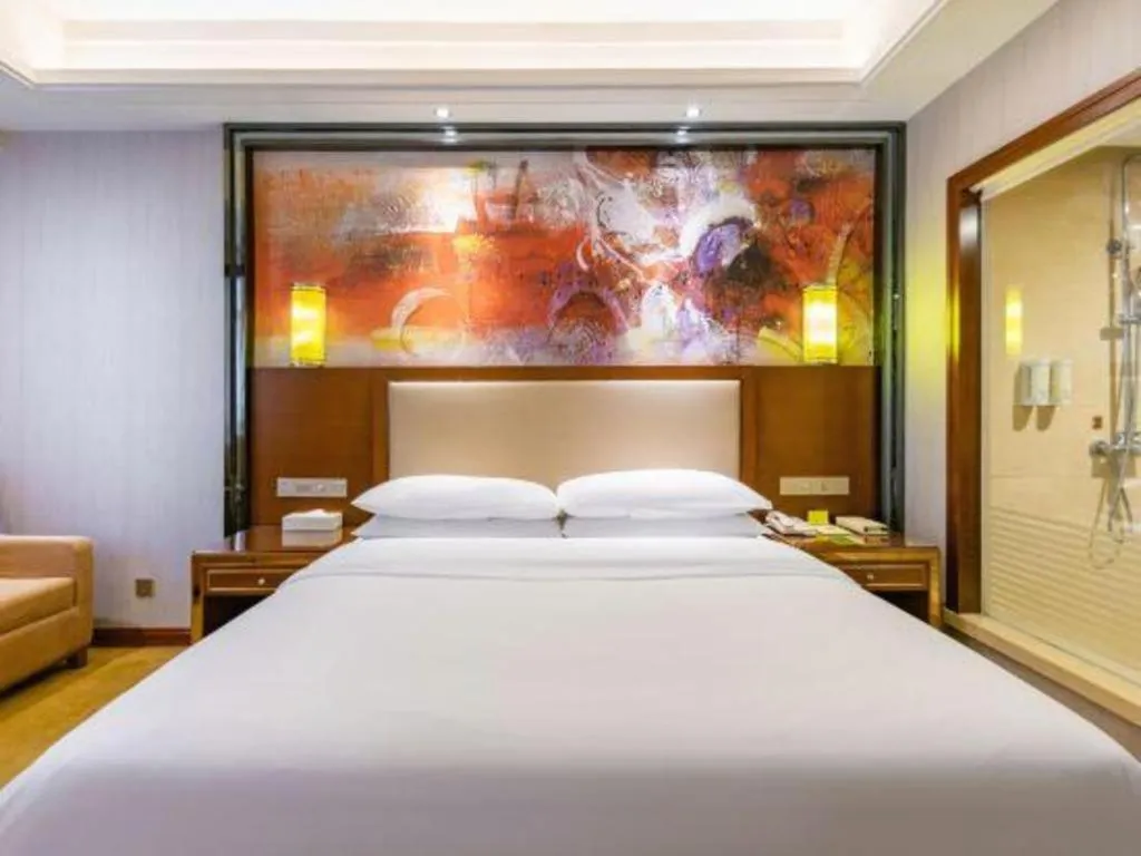 Bed in Vienna International Hotel Nanning Railway Station Mingxiu Road Metro Station