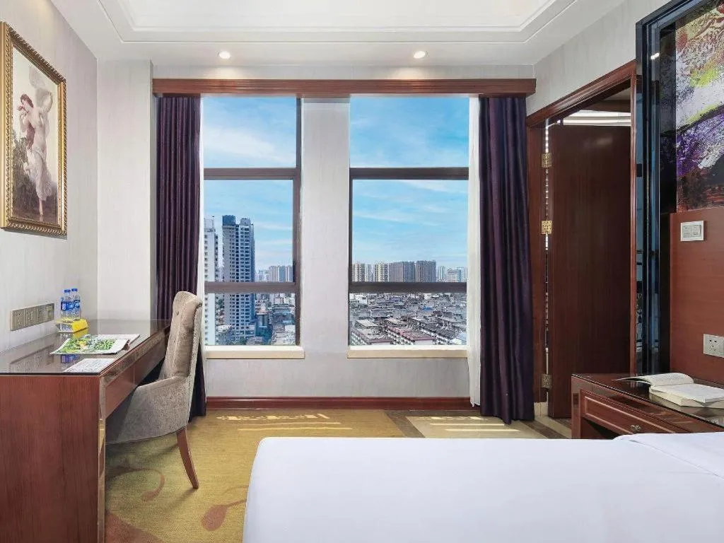 Bed in Vienna International Hotel Nanning Railway Station Mingxiu Road Metro Station