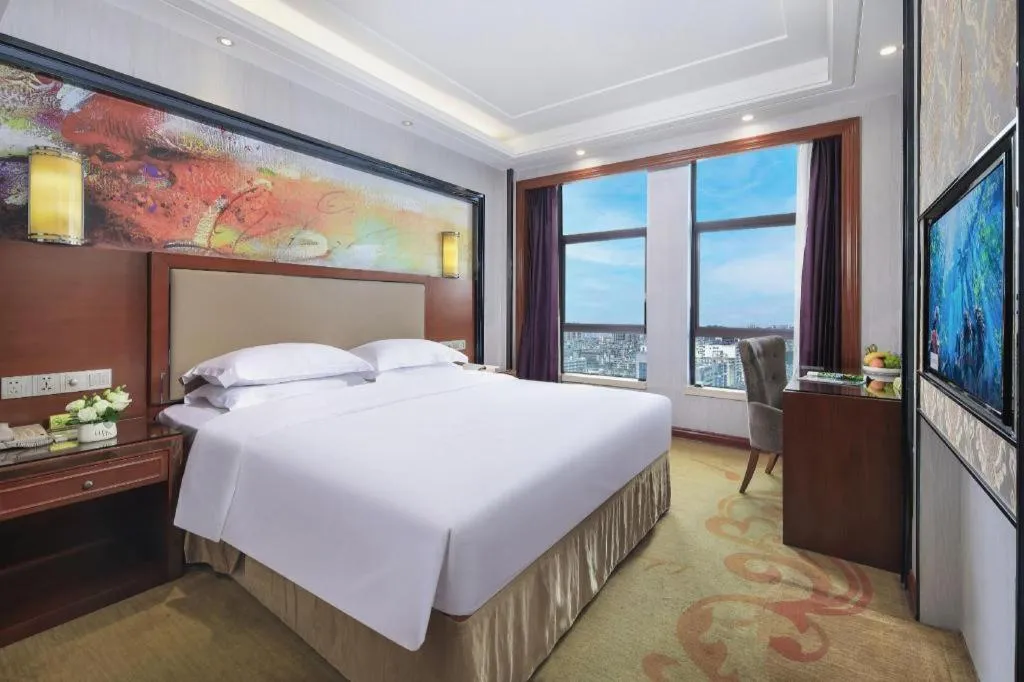 Bed in Vienna International Hotel Nanning Railway Station Mingxiu Road Metro Station