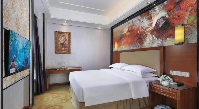 Bed in Vienna International Hotel Nanning Railway Station Mingxiu Road Metro Station