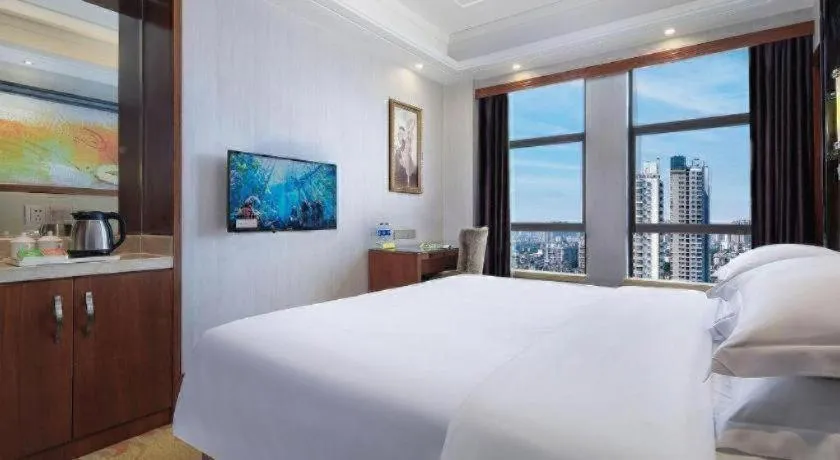 Bed in Vienna International Hotel Nanning Railway Station Mingxiu Road Metro Station