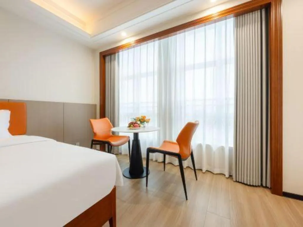 Bed in Vienna International Hotel Nanning Railway Station Mingxiu Road Metro Station