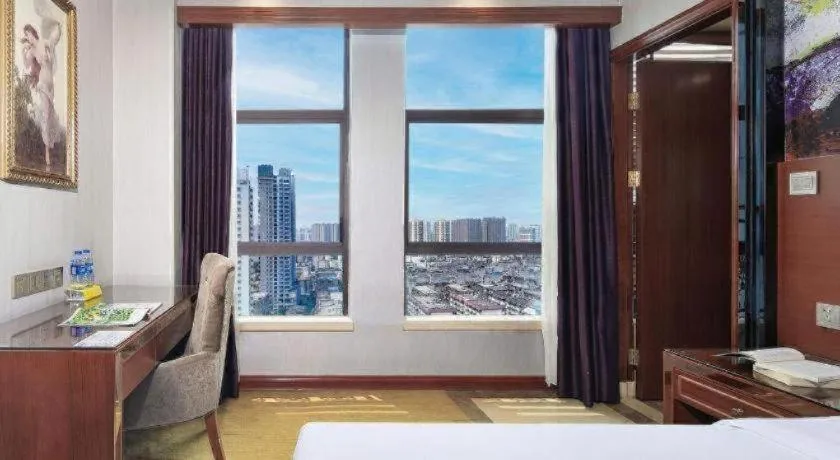 Bed in Vienna International Hotel Nanning Railway Station Mingxiu Road Metro Station