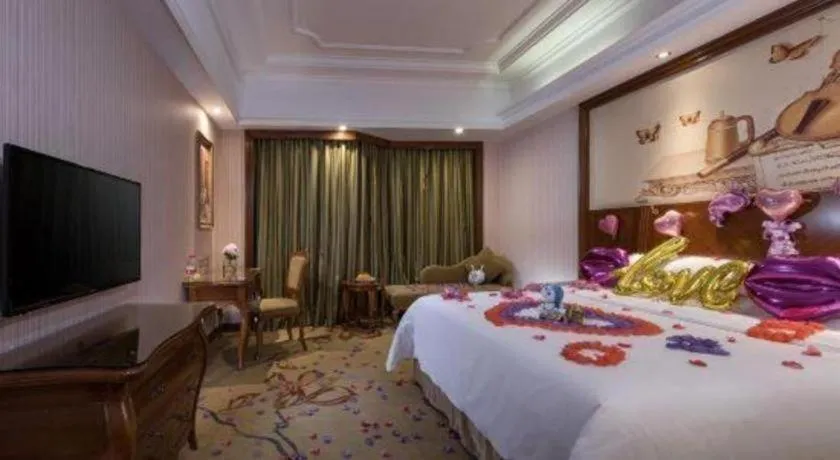 Bed in Vienna International Hotel Nanning Railway Station Mingxiu Road Metro Station