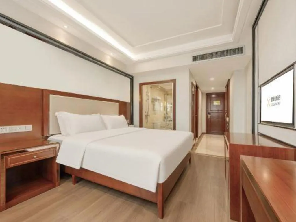 Bed in Vienna International Hotel Nanning Railway Station Mingxiu Road Metro Station