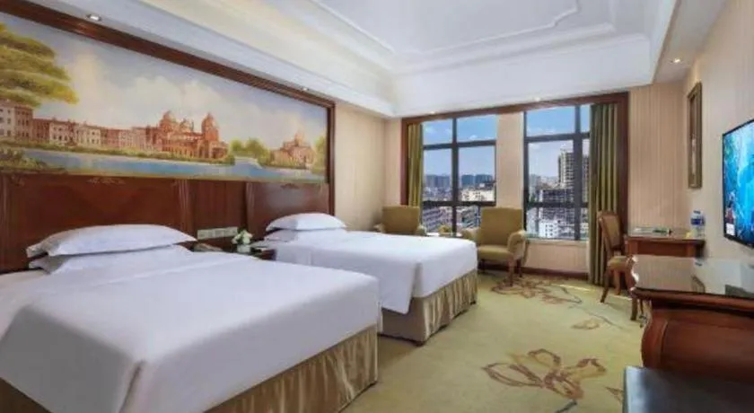 Bed in Vienna International Hotel Nanning Railway Station Mingxiu Road Metro Station