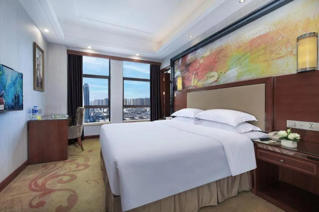Bed in Vienna International Hotel Nanning Railway Station Mingxiu Road Metro Station