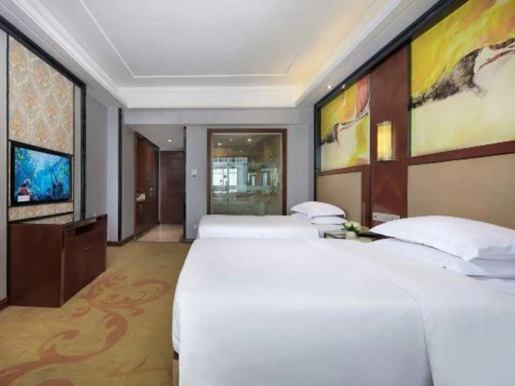 Bed in Vienna International Hotel Nanning Railway Station Mingxiu Road Metro Station