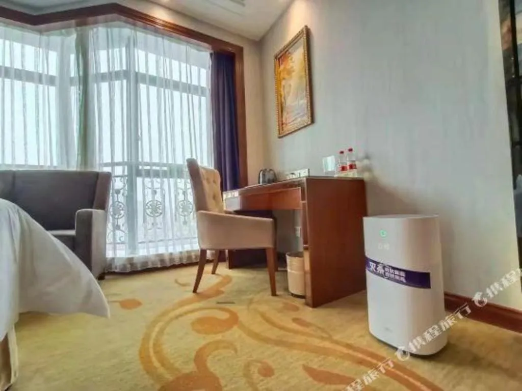 Bed in Vienna International Hotel Nanning Railway Station Mingxiu Road Metro Station