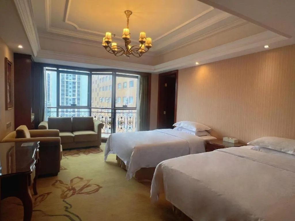 Bed in Vienna International Hotel Nanning Railway Station Mingxiu Road Metro Station