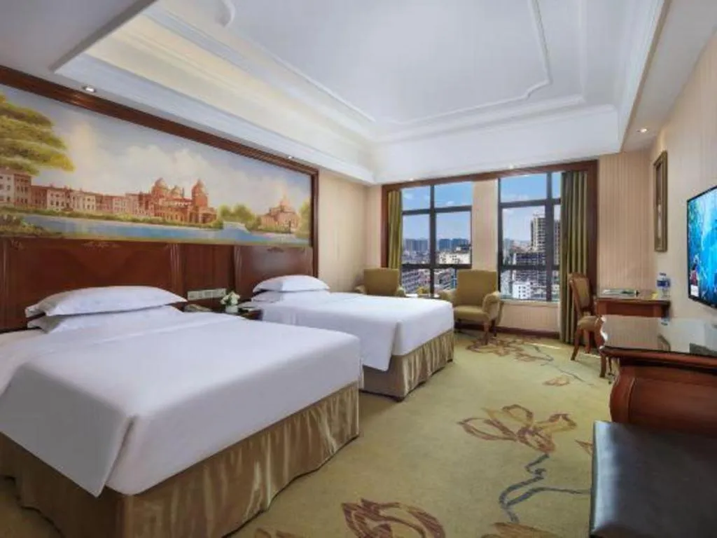 Bed in Vienna International Hotel Nanning Railway Station Mingxiu Road Metro Station