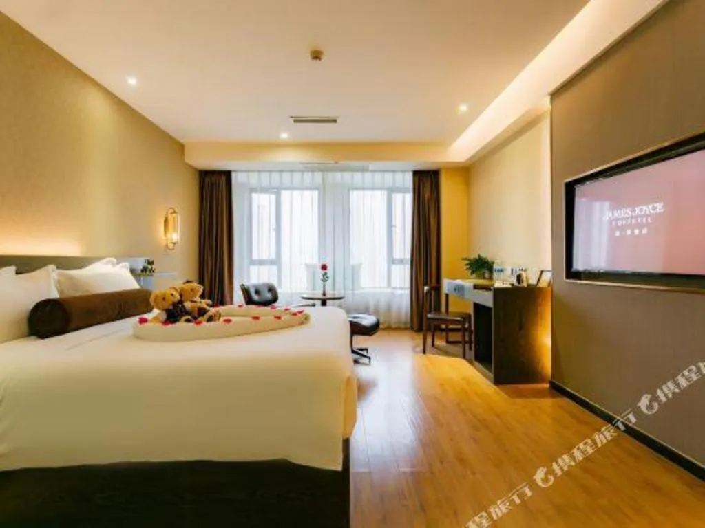 Bed in James Joyce Coffetel Chengdu Jianshe Road Dongjiao Jiyi Square