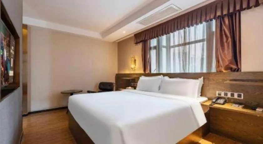 Bed in James Joyce Coffetel Chengdu Jianshe Road Dongjiao Jiyi Square