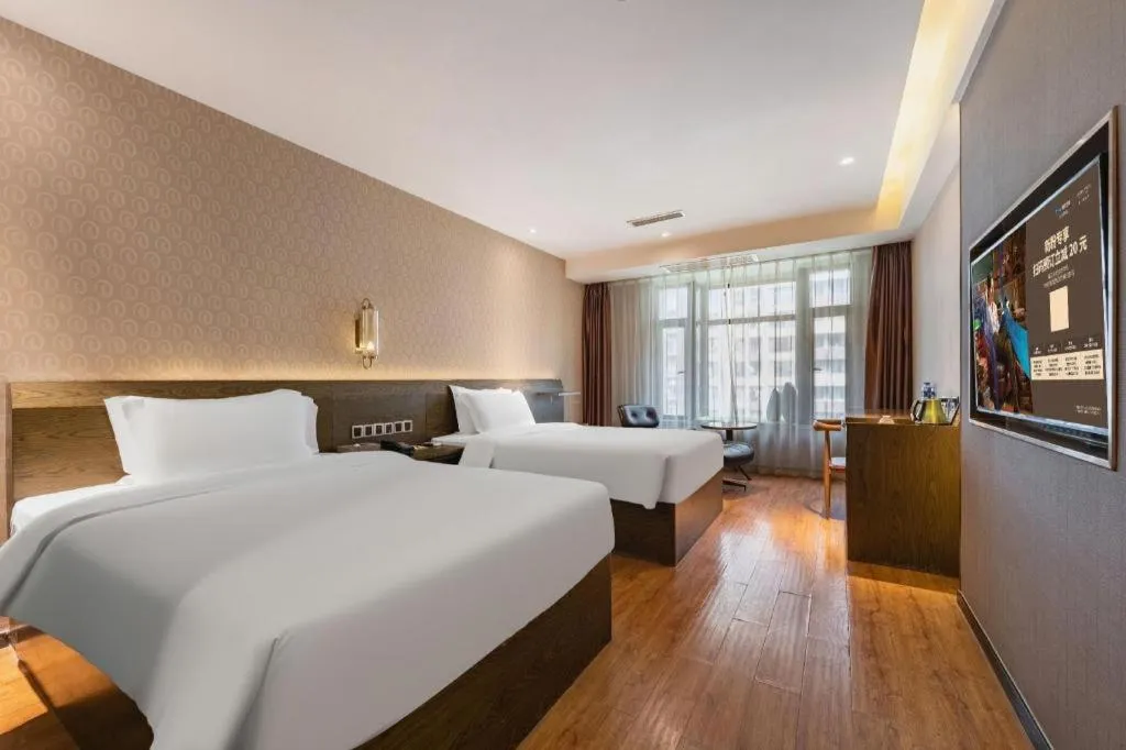 Bed in James Joyce Coffetel Chengdu Jianshe Road Dongjiao Jiyi Square