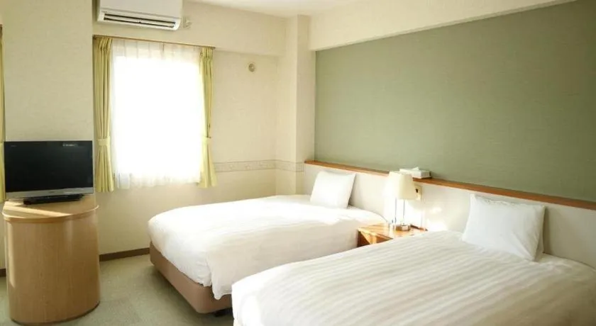 Bed in KEIKYU EX INN Yokosuka Research Park