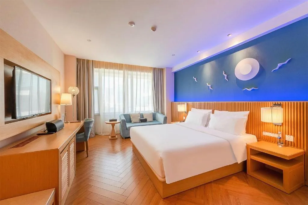 Bed in Guangzhou Crystal Orange Hotel