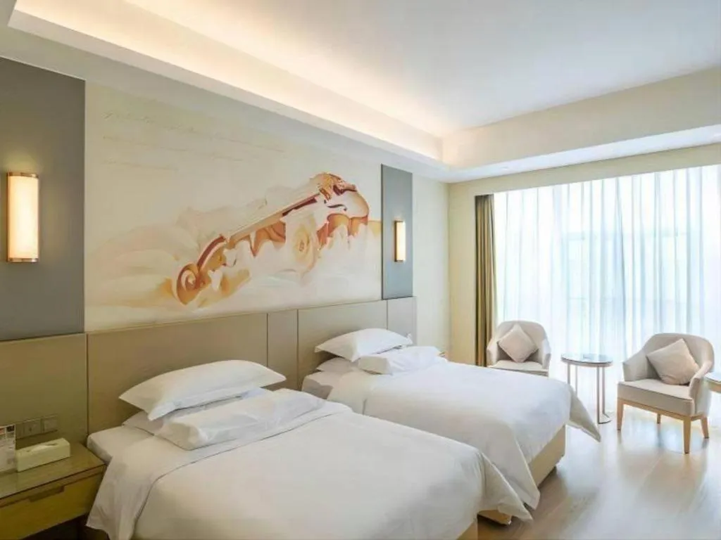 Bed in Vienna International Hotel Chengdu New International Conference and Exhibition Center Branch