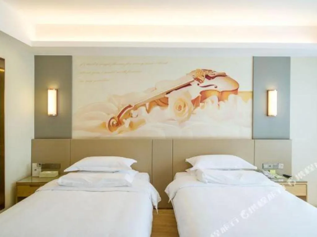 Bed in Vienna International Hotel Chengdu New International Conference and Exhibition Center Branch