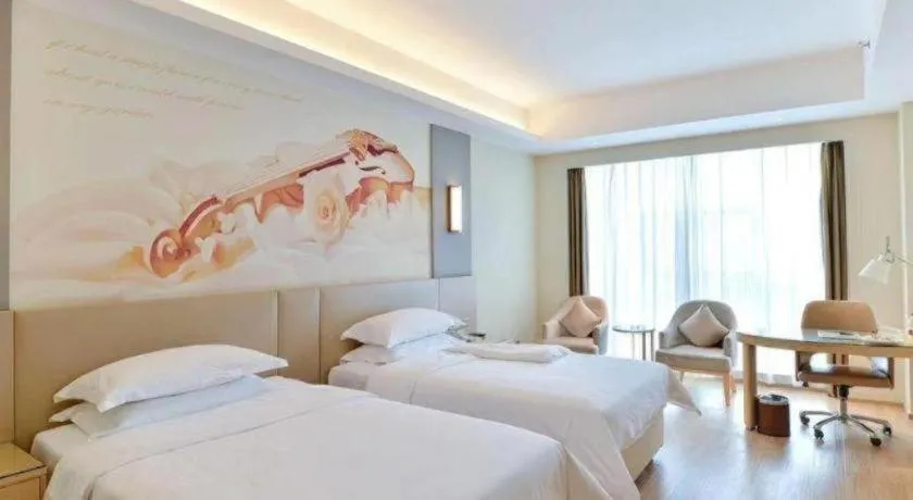 Bed in Vienna International Hotel Chengdu New International Conference and Exhibition Center Branch