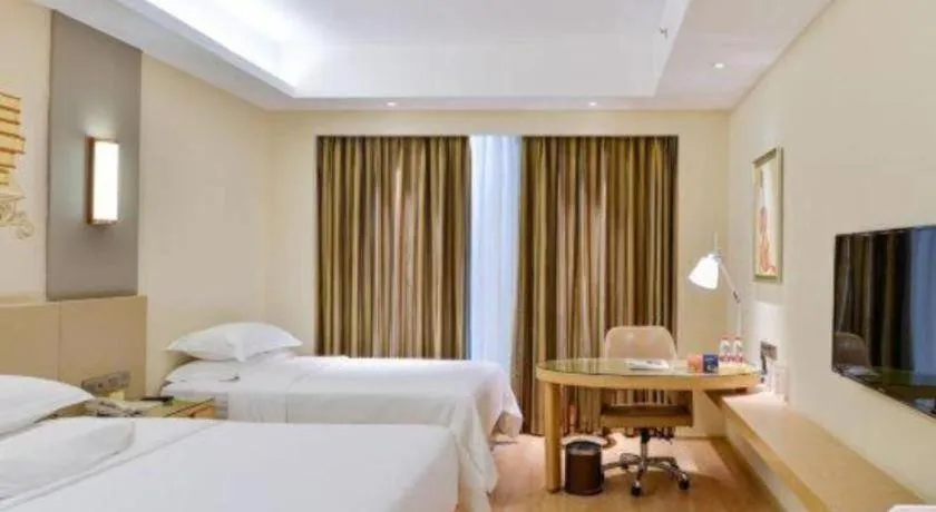 Bed in Vienna International Hotel Chengdu New International Conference and Exhibition Center Branch