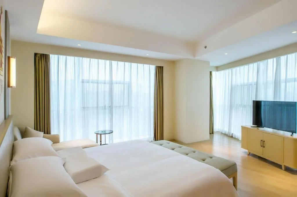 Bed in Vienna International Hotel Chengdu New International Conference and Exhibition Center Branch