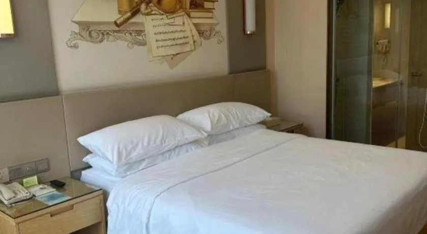 Bed in Vienna International Hotel Chengdu New International Conference and Exhibition Center Branch