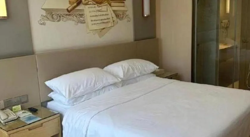 Bed in Vienna International Hotel Chengdu New International Conference and Exhibition Center Branch