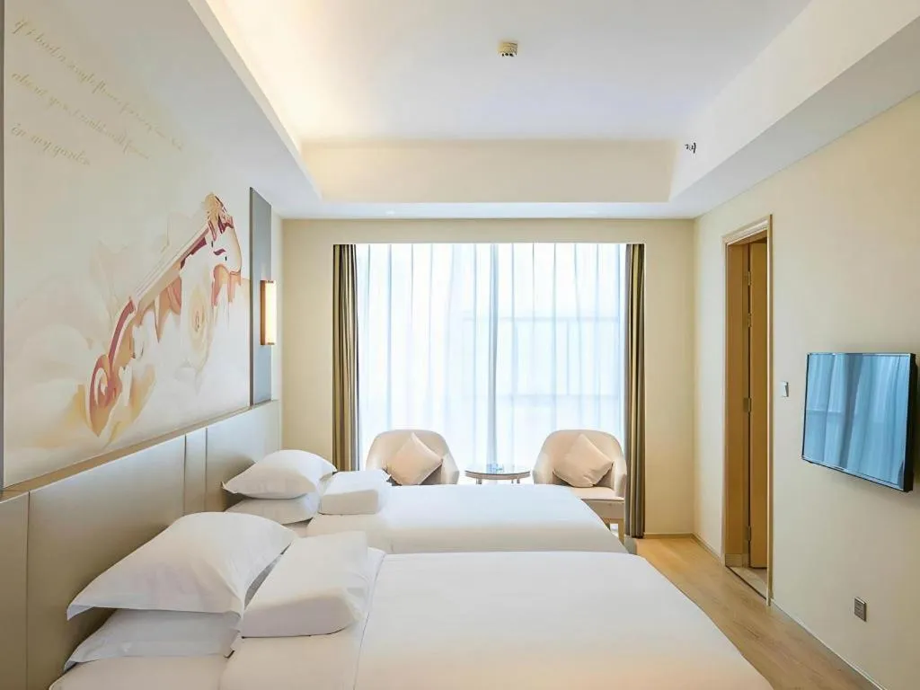 Bed in Vienna International Hotel Chengdu New International Conference and Exhibition Center Branch