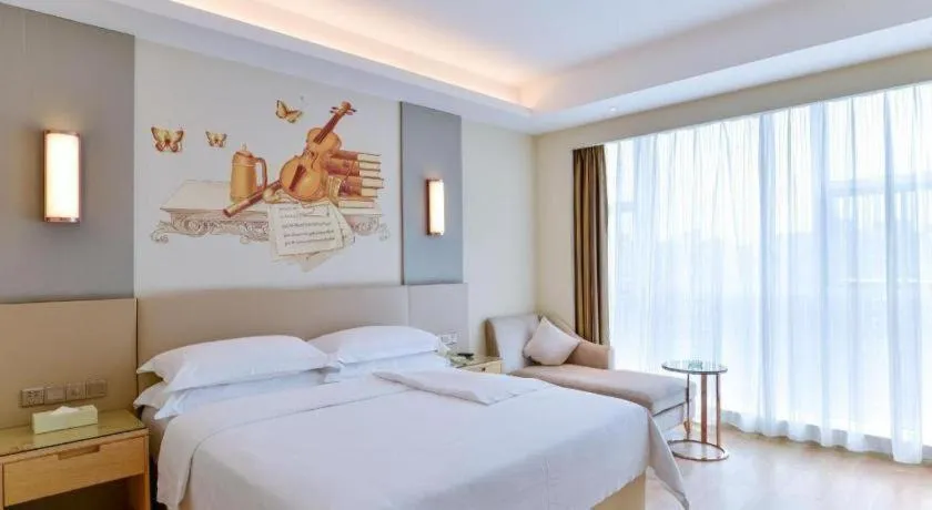 Bed in Vienna International Hotel Chengdu New International Conference and Exhibition Center Branch