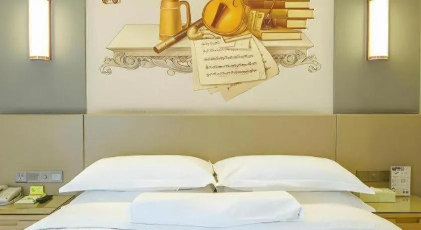 Bed in Vienna International Hotel Chengdu New International Conference and Exhibition Center Branch