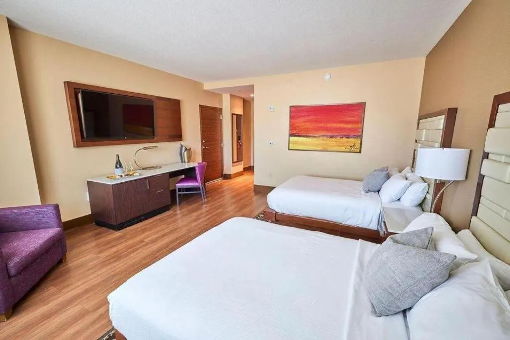 Bed in Vee Quiva Hotel & Casino