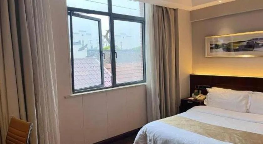 Bed in Maixinge Boutique Hotel Waigaoqiao Free Trade Zone