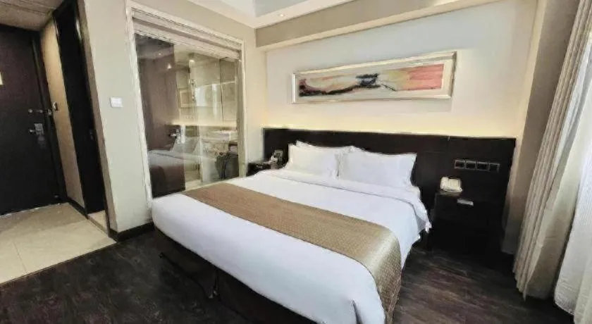 Bed in Maixinge Boutique Hotel Waigaoqiao Free Trade Zone