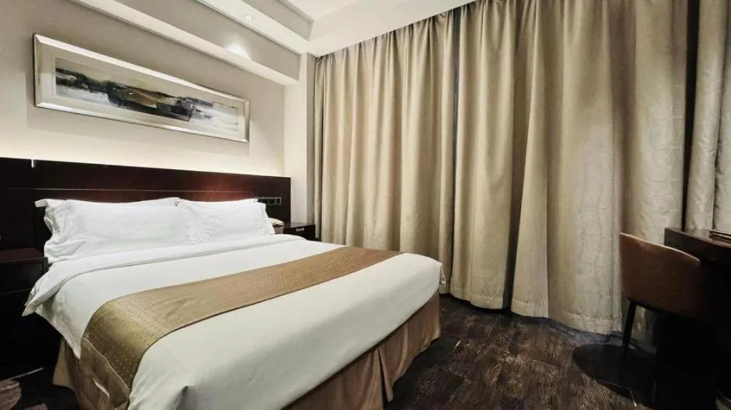 Bed in Maixinge Boutique Hotel Waigaoqiao Free Trade Zone